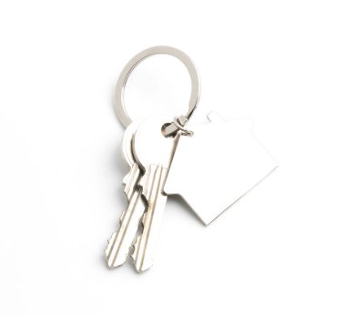 Beyaz arka plan üzerinde izole evin anahtarı