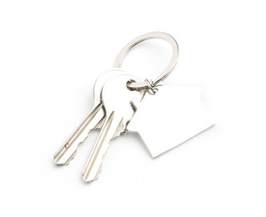 Beyaz arka plan üzerinde izole evin anahtarı