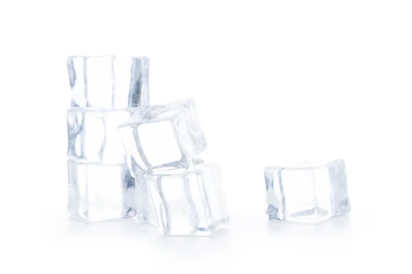 Cubitos de hielo aislados en blanco — Foto de Stock