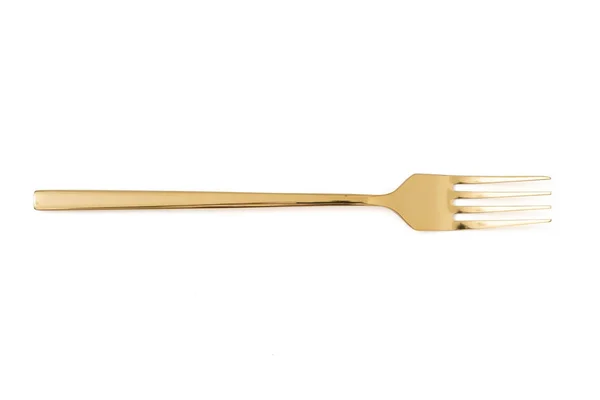 Tenedor dorado aislado sobre un blanco —  Fotos de Stock