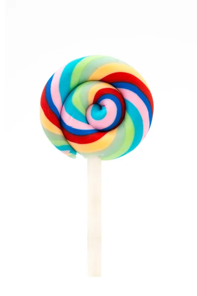 Pelangi berwarna-warni lolipop swirl terisolasi pada putih — Stok Foto