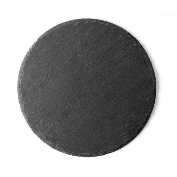 Чорна кругла кам'яна тарілка ізольована на білому — стокове фото