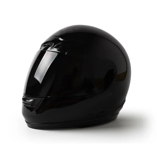 Черный мотоциклетный шлем изолирован на белом — стоковое фото