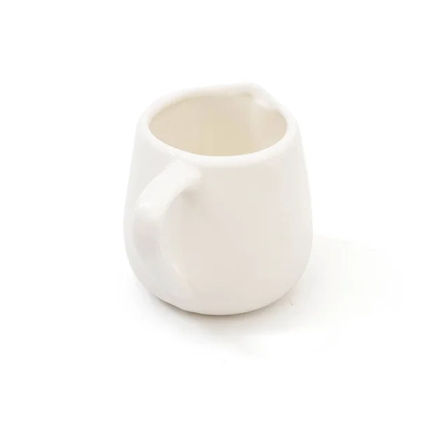 Milk jug with milk on the white — Stock Photo, Image