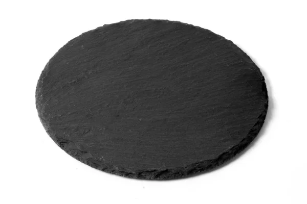 Placa de piedra redonda negra aislada en blanco —  Fotos de Stock