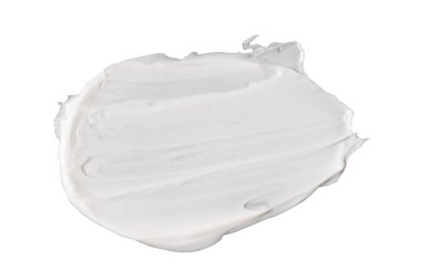 Beyaz arkaplanda beyaz kozmetik yüz kremi dokusu