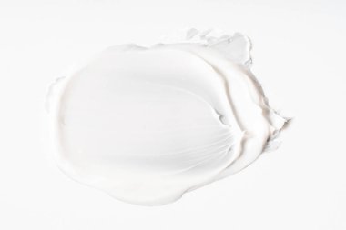 Beyaz arkaplanda beyaz kozmetik yüz kremi dokusu