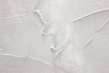 Islak beton duvar dokusu yakın plan. Çizikli sert çimento dokusu. Beyaz, gri duvar kağıdı soyut grunge arka plan. Taş duvar yüzeyi arka planı. Stok fotoğrafı