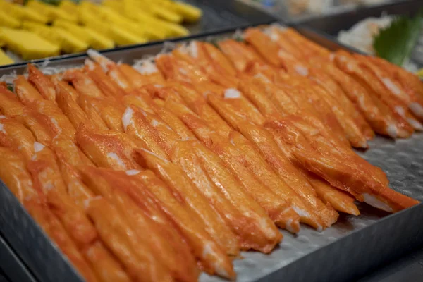 Crab sticks placed in trays, Japanese restaurants