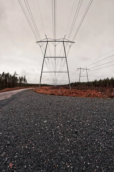 Gravel Road Leads Giant Pilars Holding Power Lines Northern Finland — Stock Photo, Image