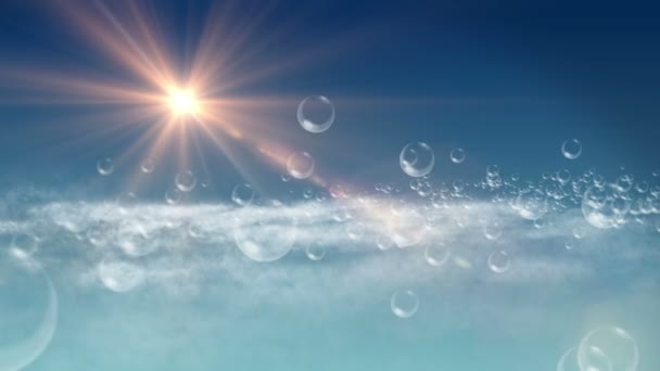 Bubbles in blue sky, sun ray — Stock Video