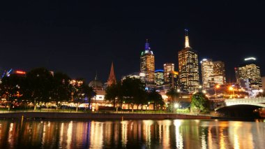 Australia, Victoria, Melbourne downtown and Yarra river at night time. Space for text clipart