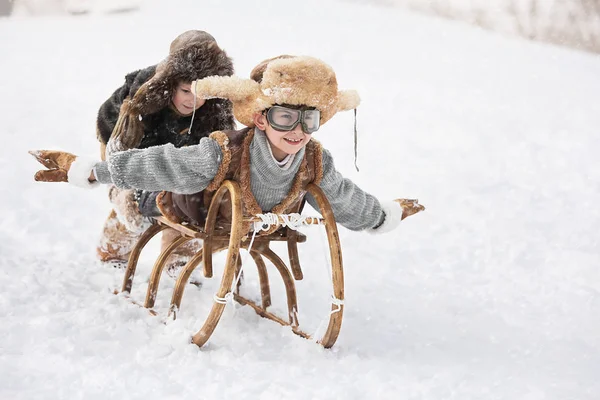 Two Boys Sledding Mountain Warm Winter Day — Stock Photo, Image