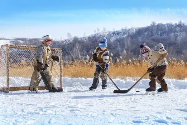 Boys Play Hockey Frozen Lake Winter Sunny Day — Stock Photo, Image