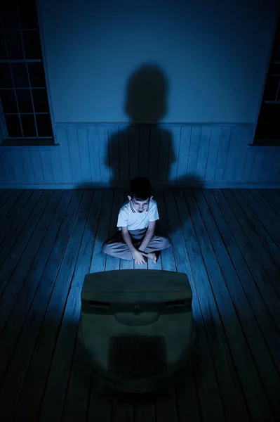 Boy watching TV at night — Stock Photo, Image