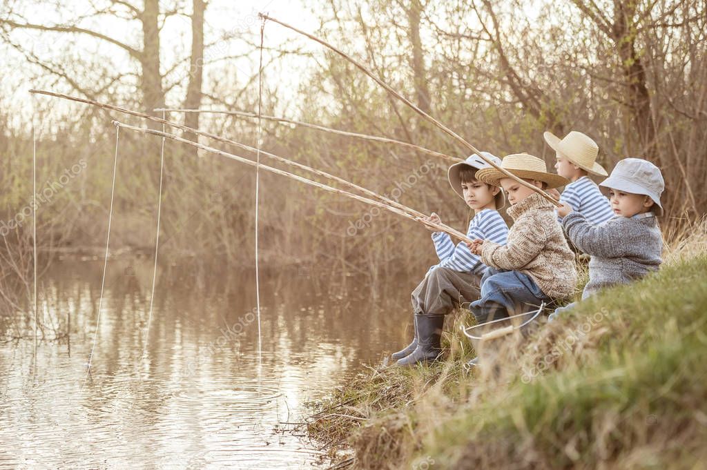 Boys fishing on the lake