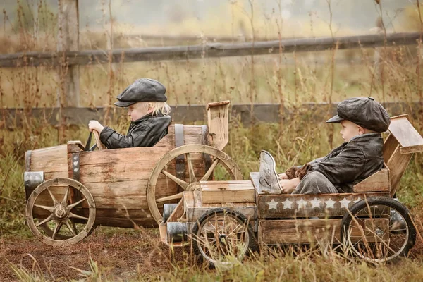 Two Boys Riders Compete Each Other Homemade Wooden Car Rural — Stock Photo, Image