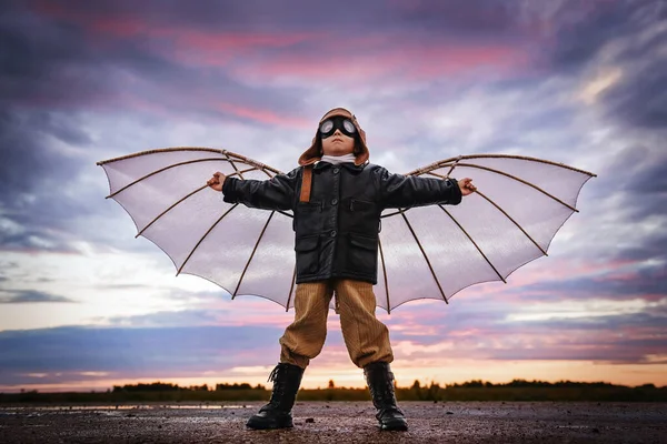 Boy Wings Sunset Imagines Himself Pilot Dreams Flying — Stock Photo, Image