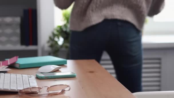 Young Woman Dances in her Home Office — Stock video