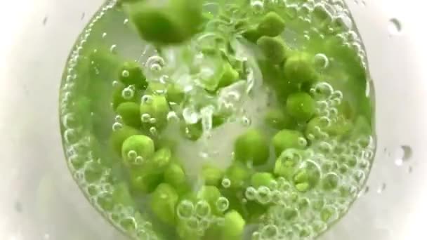 Pouring Water Torrent Fresh Organic Green Peas Bowl Water Creating — Stock Video