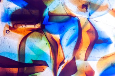 Çok renkli erimiş camın soyut arkaplanı.