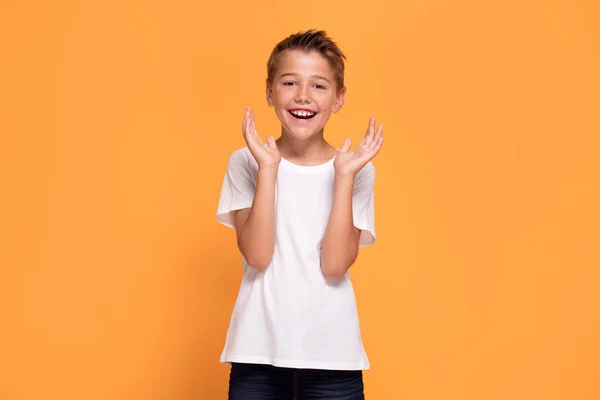 Young Emotional Handsome Boy Standing Orange Studio Background Human Emotions — Stock Photo, Image