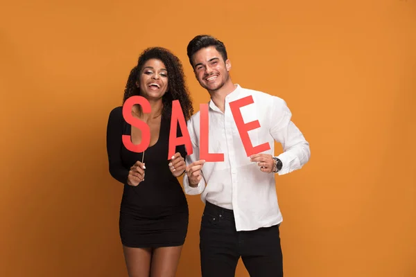 Happy Beautiful Couple Posing Red Sale Letters Smiling African American — Stock Photo, Image