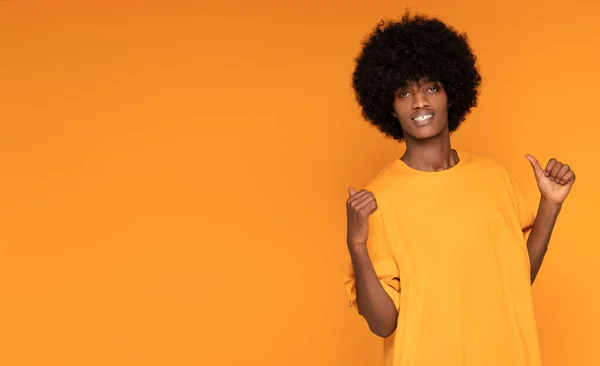 African Man Posing Orange Studio Background — Stock Photo, Image