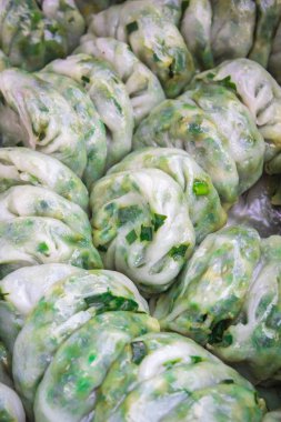 Sarımsak chives, Kanom Kuicheai ile doldurulmuş buharda pişmiş hamur tatlısı.