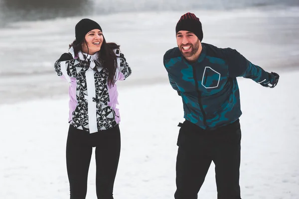 Sport Couple Exercising Outdoors Cold Winter Day Royalty Free Stock Images