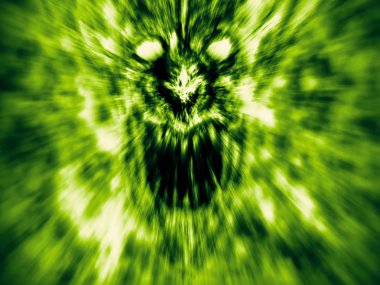 Kızgın iblis yüz yangında bağırır. Bir tür korku. Yeşil renk arka plan.