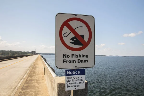 Augusta, Ga / USA - 10 13 20: No fishing from dam sign — Stock Image Augusta Usa Fishing Dam Sign Stock Picture
