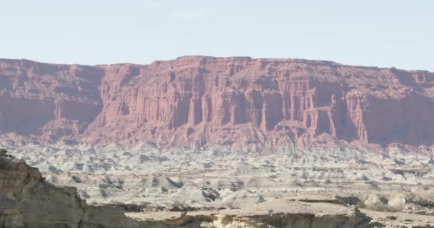Red huge eroded cliffs and white lanscape of Ischigualasto Provincial Park. World Natural Heritage. General view of natural geological formations. Rioja Province — Stock Video