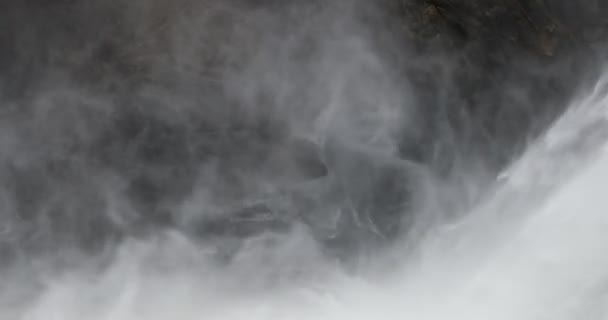 Detail of waterfall, crop of strenght of water and vapor splashing against rock walls creating organic drawings. Cordoba, Argentina — Stockvideo