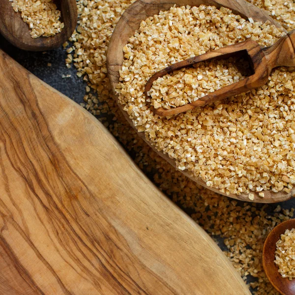 Dry bulgur wheat grains — Stock Photo, Image