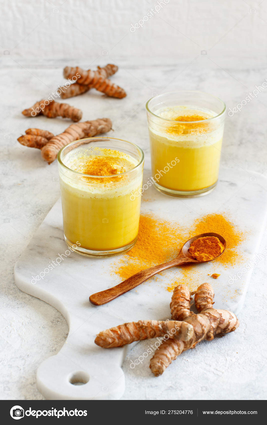 Golden milk with turmeric powder Stock Photo by ©karissaa 275204776