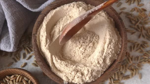 Raw rye flour in a bowl close up — Stock Video