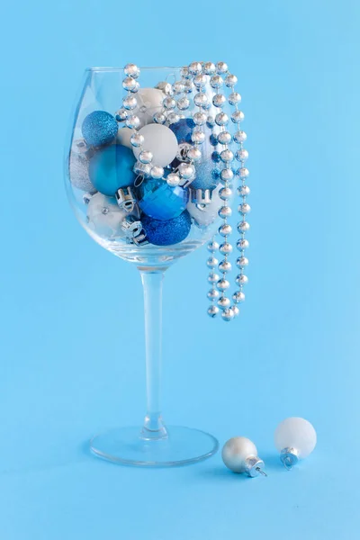 Christmas Baubles Wine Glass Light Blue Background Close — Stock Photo, Image