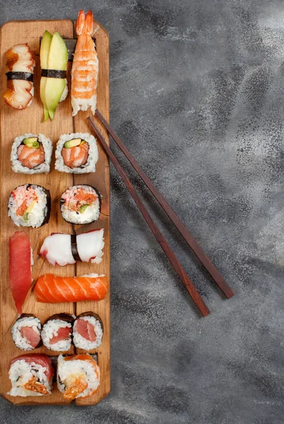 Sushi Set Nigiri Sushi Rolls Wooden Plate Top View — 图库照片