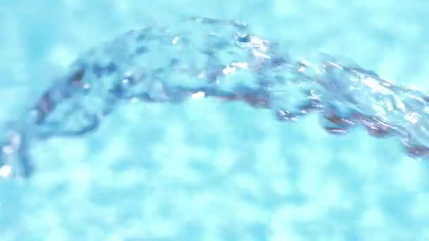 Pool Water Background Loop. 4k, close-up. water flows into the pool from the hose. Slow motion — Stock Video