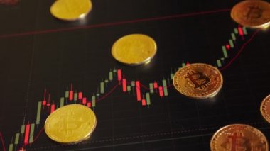 altın arka plan parlak mali grafik üzerinde bitcoins. iş grafik yakın çekim. Cryptocurrency. Sanal para, büyük 4k.