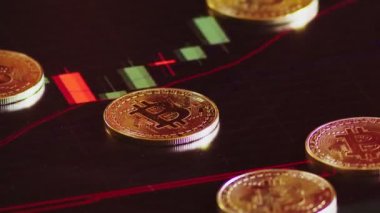 altın arka plan parlak mali grafik üzerinde bitcoins. iş grafik yakın çekim. Cryptocurrency. Sanal para, büyük 4k.