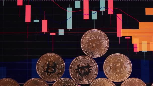 Koin emas, bitcoin pada latar belakang grafik keuangan yang cerah. grafik bisnis close-up. Cryptocurrency. Mata uang virtual, 4k besar . — Stok Video