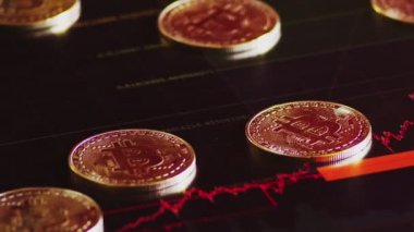 altın arka plan parlak mali grafik üzerinde bitcoins. iş grafik yakın çekim. Cryptocurrency. Sanal para, büyük 4k.
