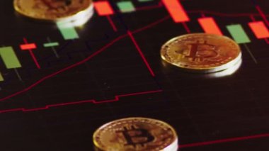 altın arka plan parlak mali grafik üzerinde bitcoins. iş grafik yakın çekim. Cryptocurrency. Sanal para, büyük 4k.