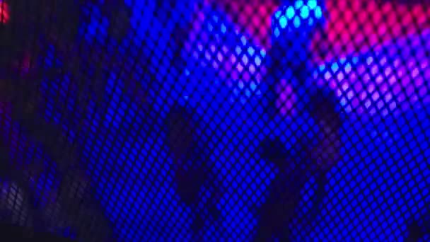 Wazig verlichting in een nachtclub voor achtergrond. Weinig licht getinte afbeelding. Bokeh voor achtergrond concept. — Stockvideo