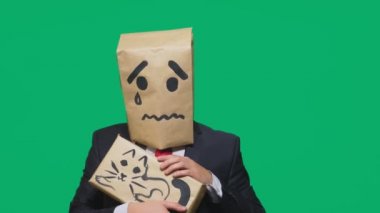 duygu, jest kavramı. Ağlama, üzgün ve bir kedi okşayarak boyalı bir gülen gülümse. kutunun üzerinde çizilmiş