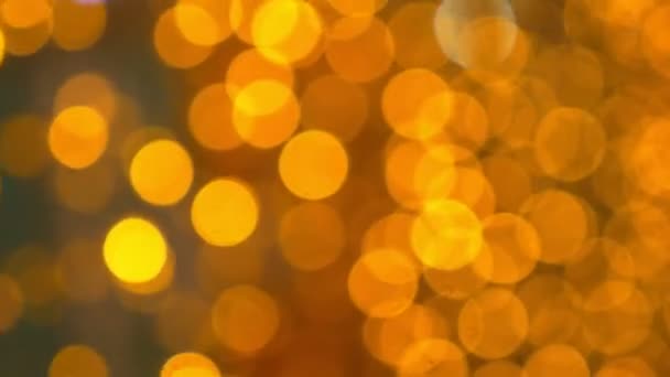 Golden bokeh background. a lot of golden blurry lights — Stock Video