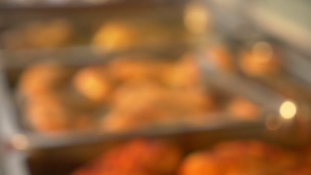 Close-up. Chicken legs in tomato sauce on a tray. — Stock Video