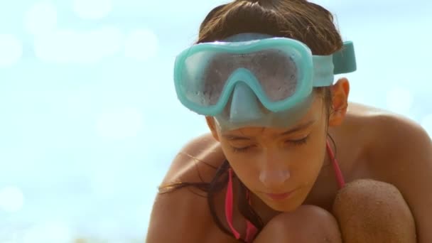 Girl Underwater Mask Sits Shore — Stock Video